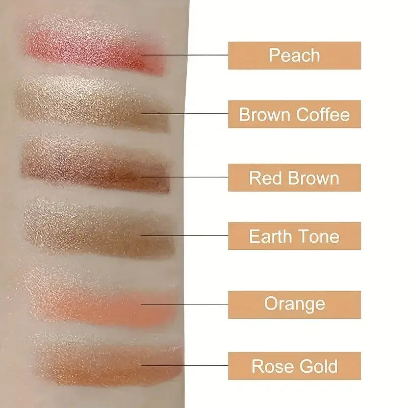 Arm swatches of shimmery eyeshadows.