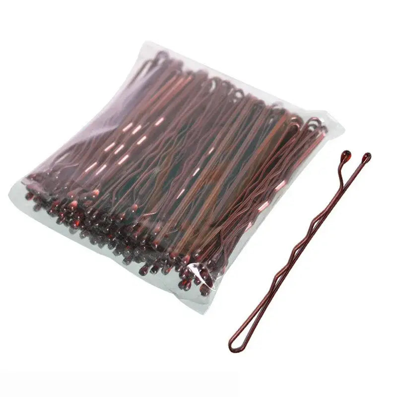 Brown bobby pins packaged in a clear plastic bag.