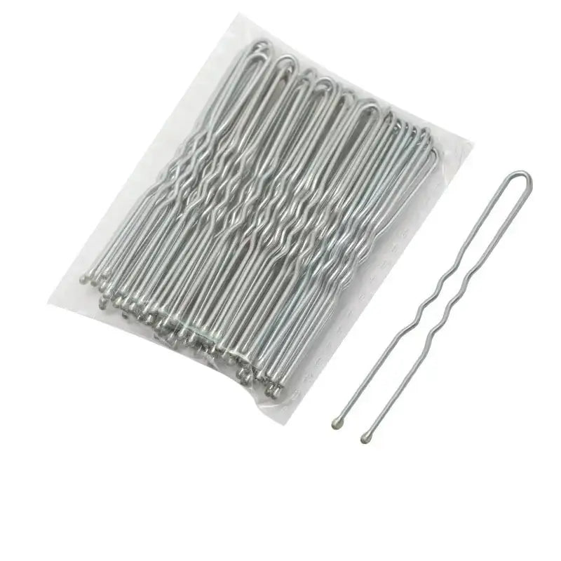 Silver metal hair pins with wavy U-shaped design.