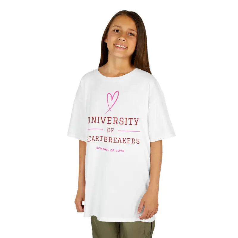 White t-shirt with pink ’University of Heartbreakers’ text and heart design.