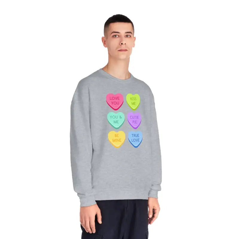 Grey sweatshirt featuring six colorful candy heart designs arranged in rows.