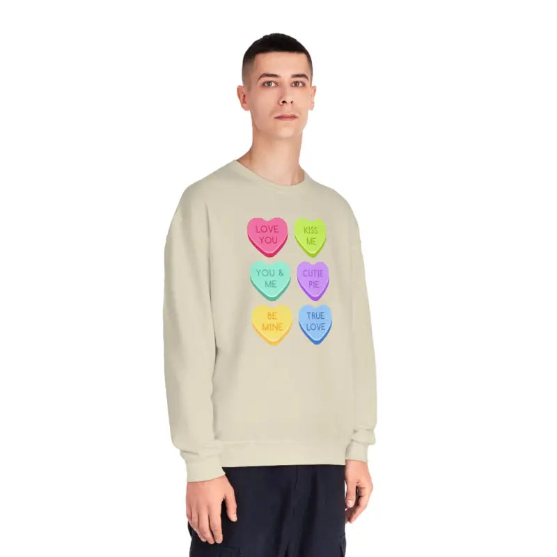 Beige sweatshirt featuring six colorful candy heart designs arranged in rows.