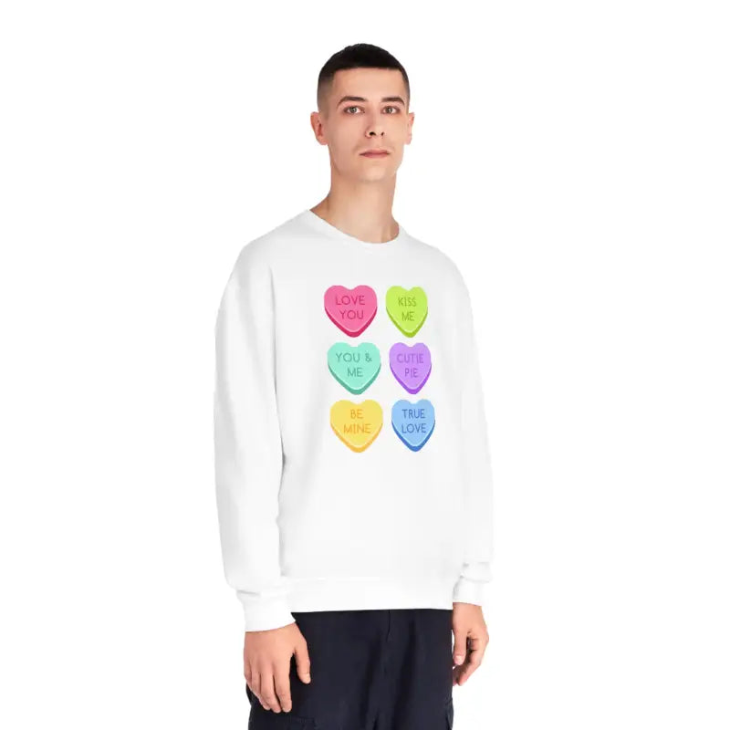 White sweatshirt featuring colorful candy heart designs arranged in a grid pattern.