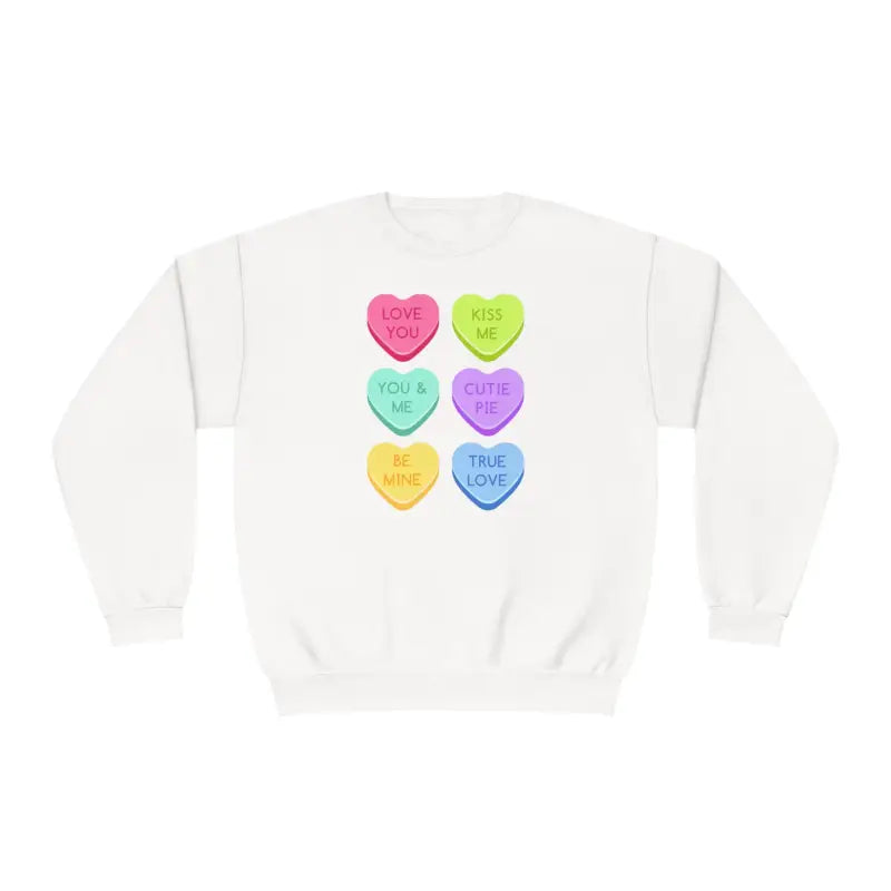 White sweatshirt featuring six colorful heart-shaped candy designs arranged in rows.