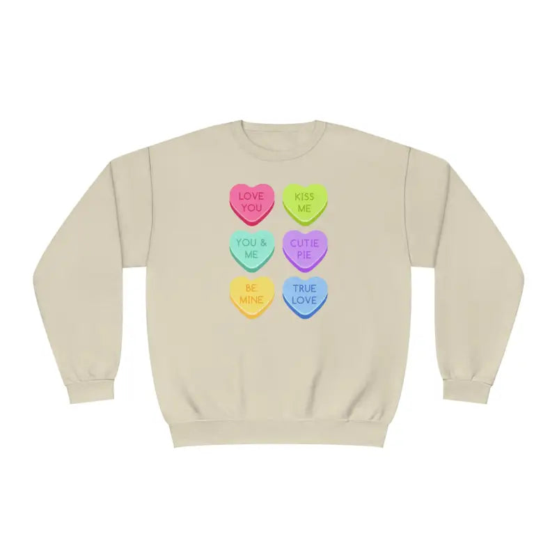 Beige sweatshirt with colorful candy heart designs printed on the front.