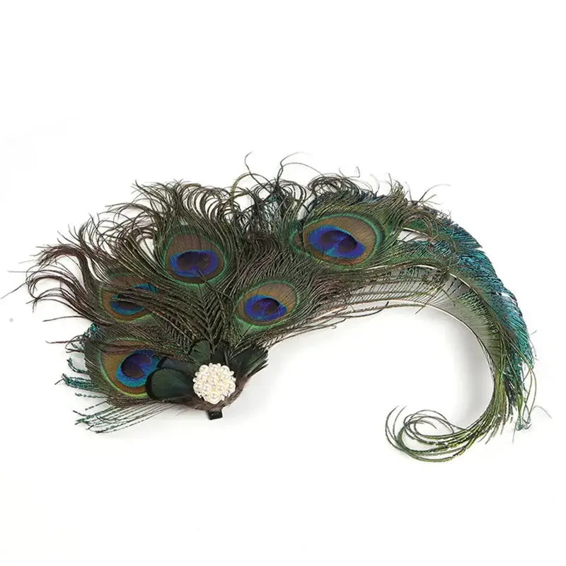 Peacock feather headpiece with pearl embellishment.
