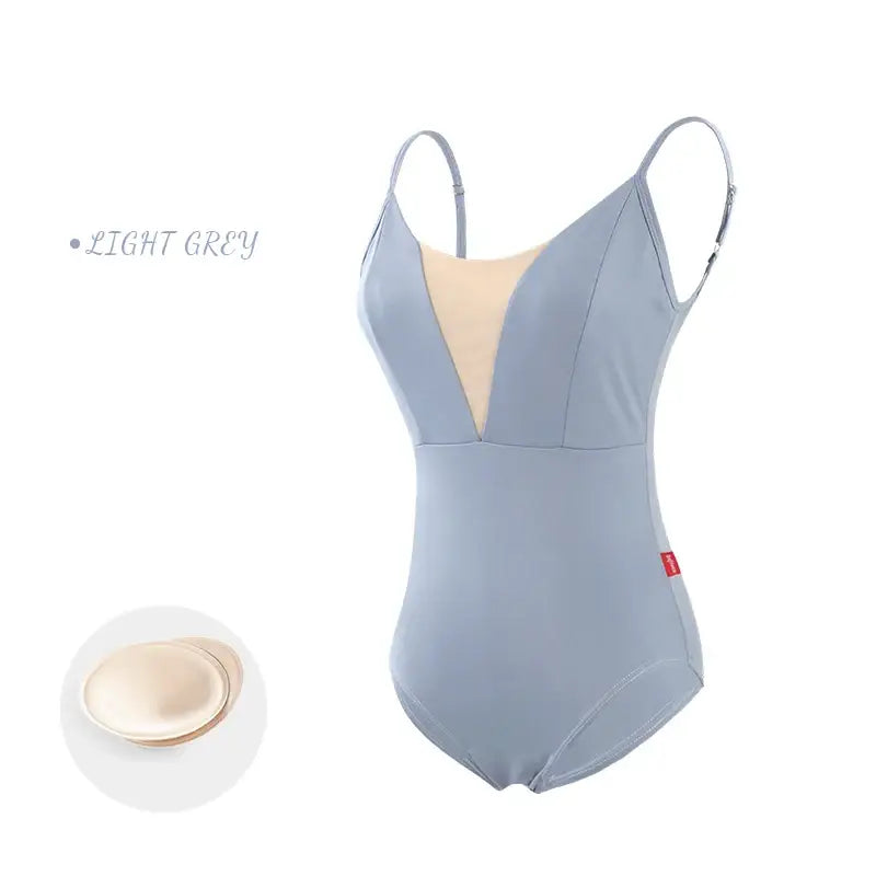 Light grey one-piece swimsuit with mesh insert and spaghetti straps.