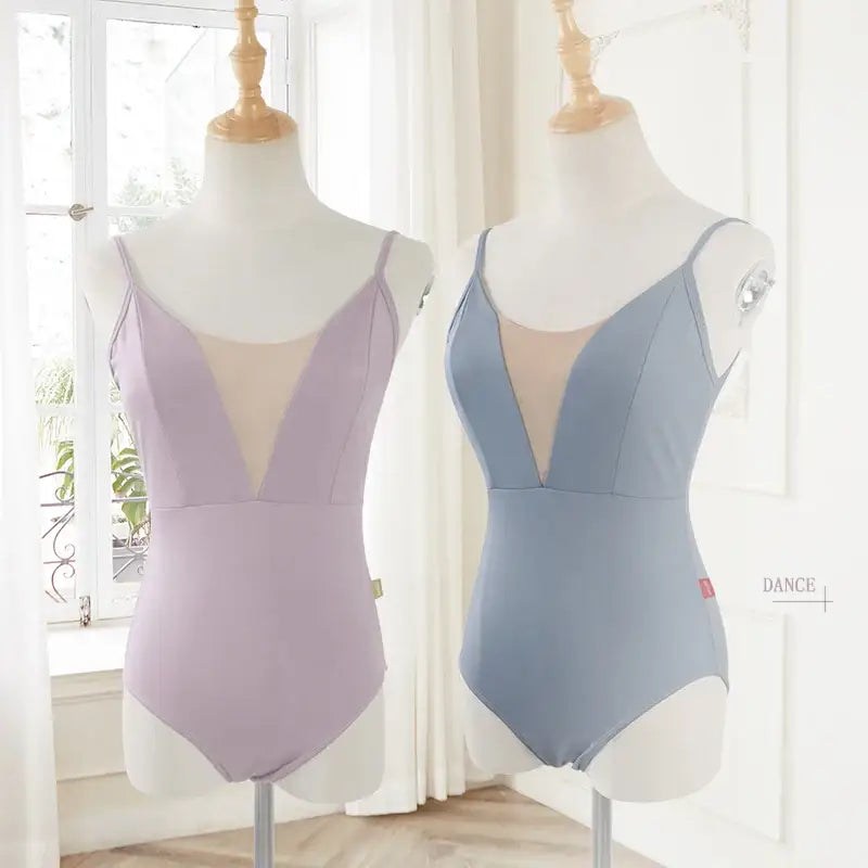 Two ballet leotards with mesh v-neck inserts in lavender and powder blue colors.