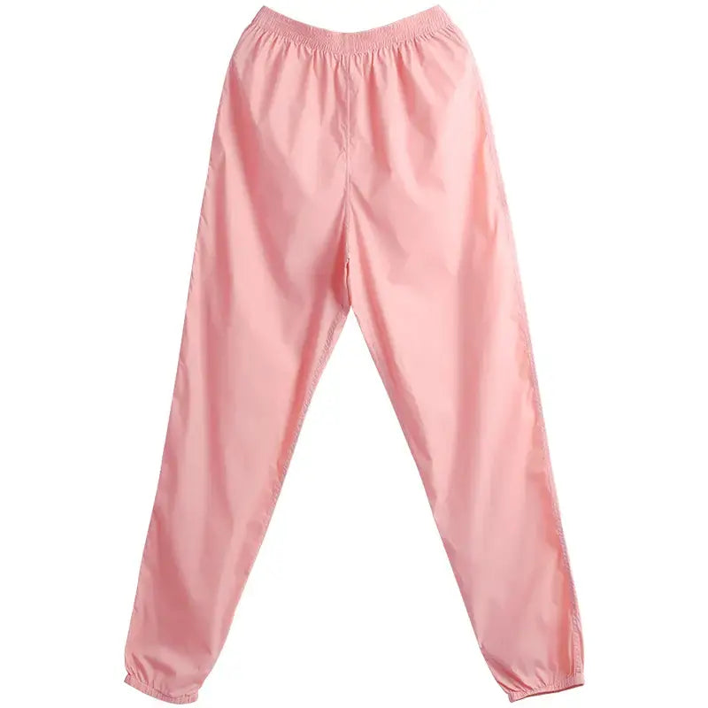 Pink elastic-waist sweatpants with gathered ankles.