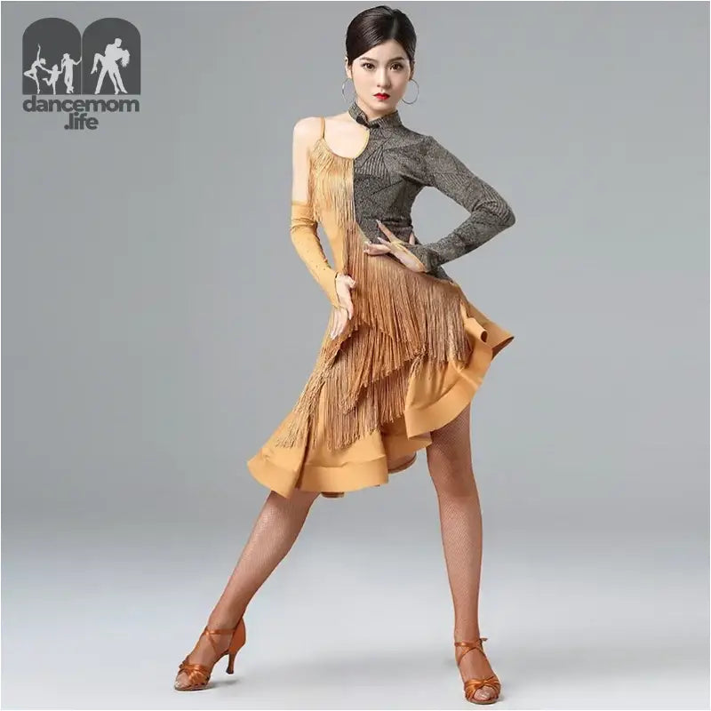Woman in a fringed, asymmetrical ballroom dress.