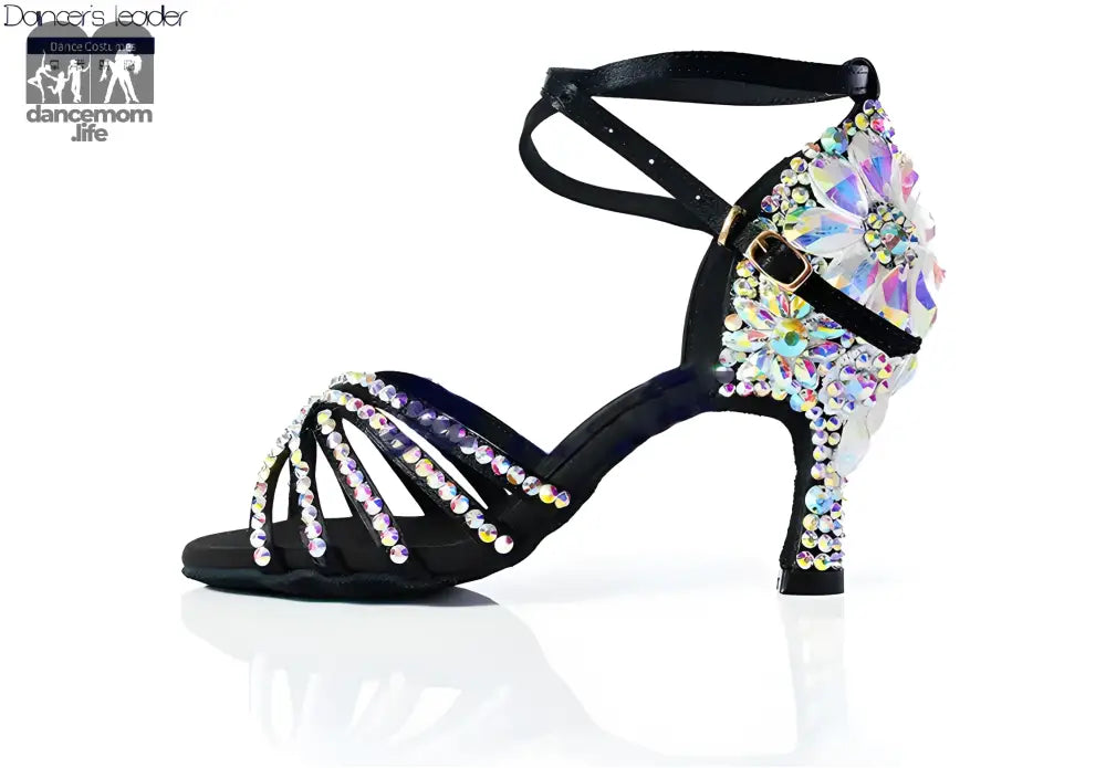 Rhinestone-studded black dance shoe.