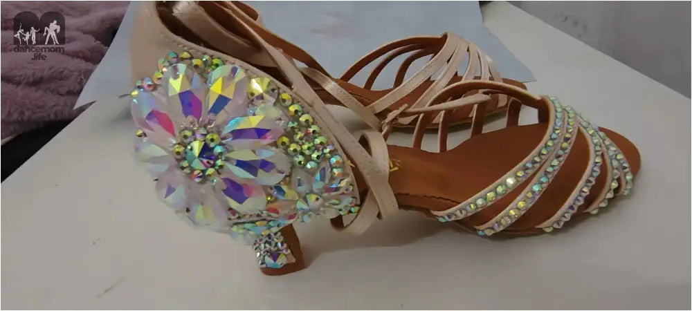 Rhinestone-embellished ballroom dance shoes.