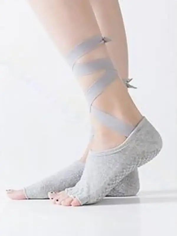 Gray ballet-style yoga socks.
