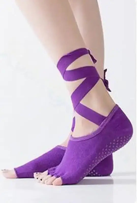 Purple toe socks with ankle straps.