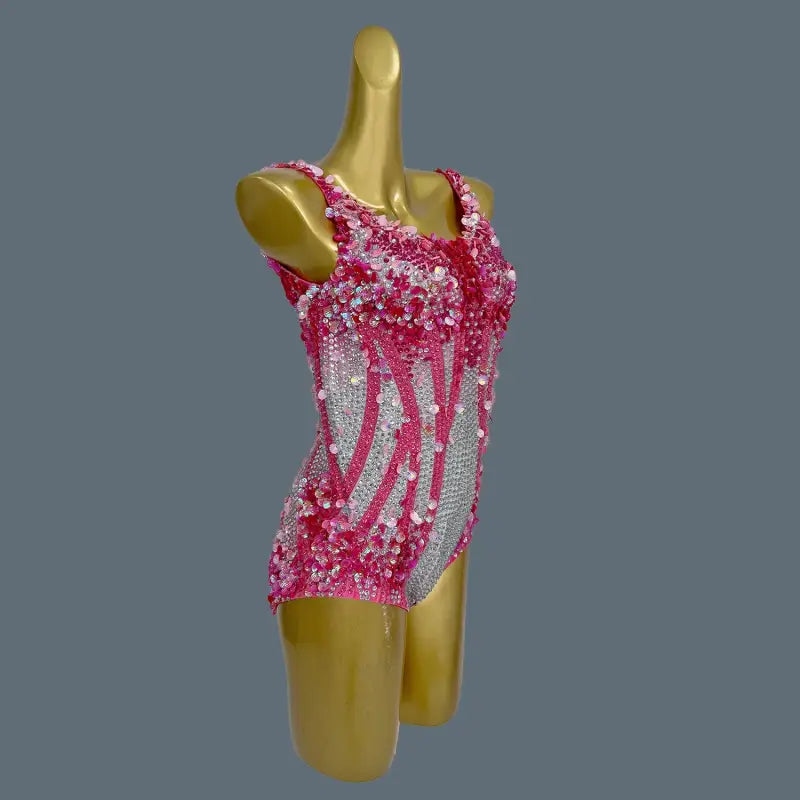 Pink and silver sequined bodysuit.