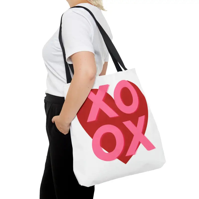White tote bag featuring ’XOXO’ text in red and pink colors.