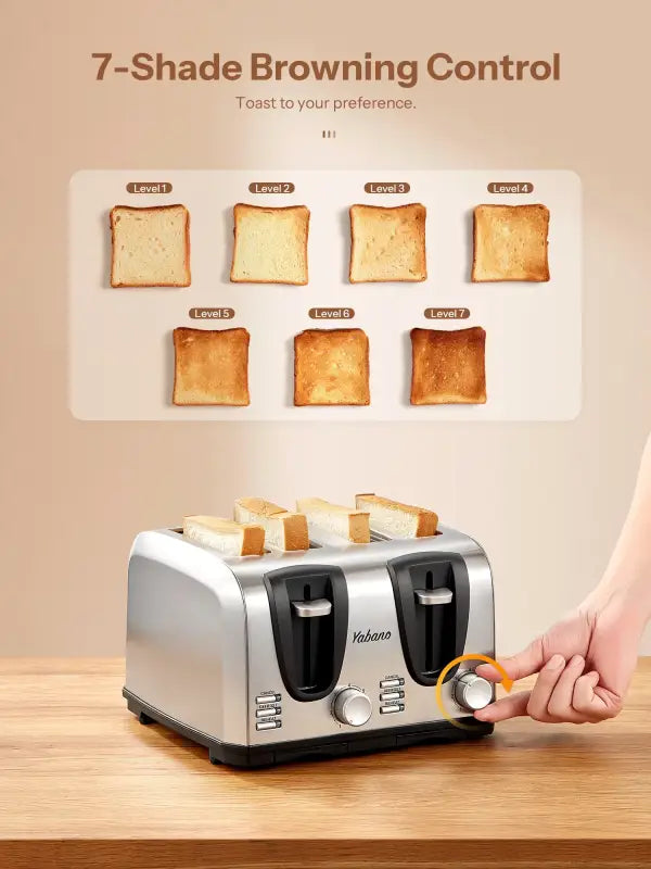 Silver four-slice toaster with browning control.