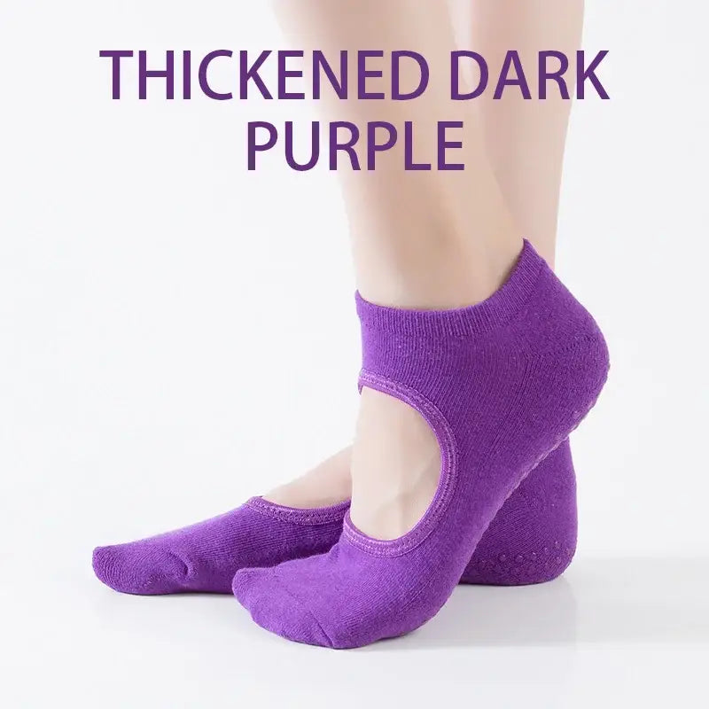 Purple yoga socks.