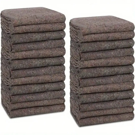 Two stacks of brown moving blankets.