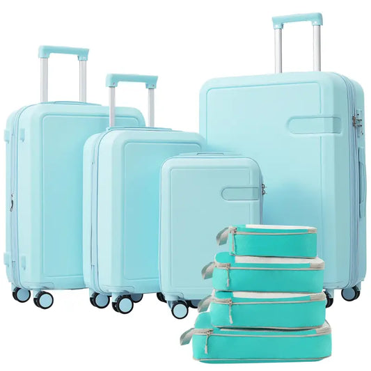 Aqua luggage set with packing cubes.