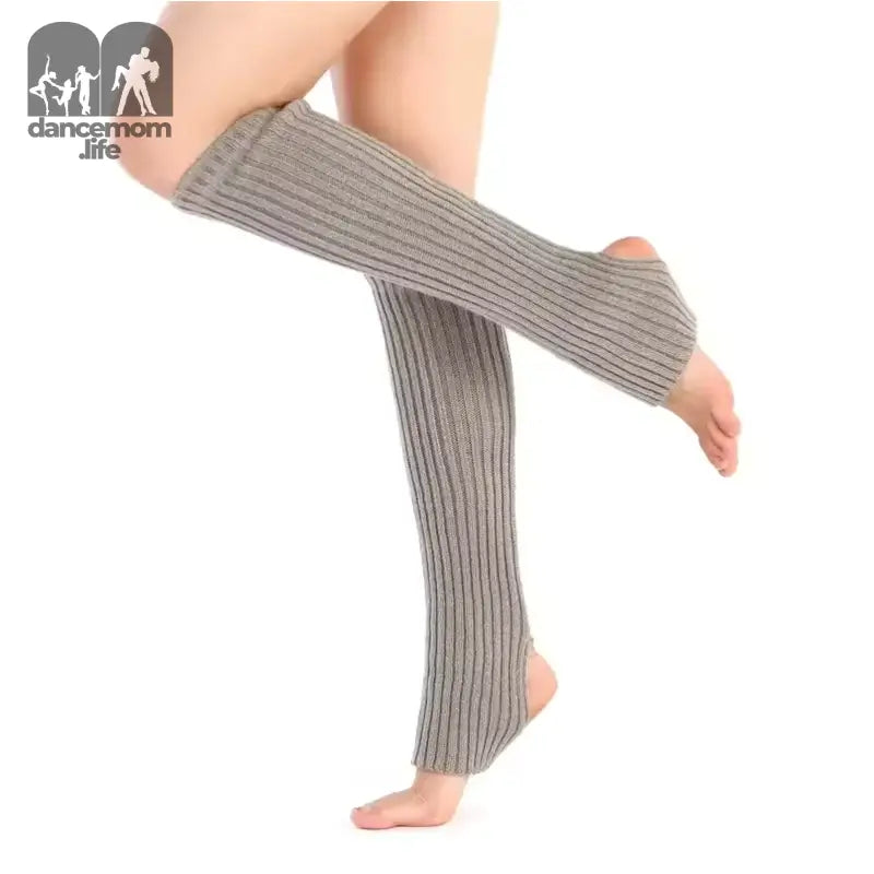 Gray ribbed leg warmers with open heel and toe design.