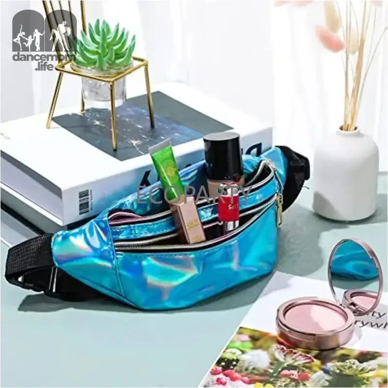 Metallic turquoise fanny pack with black zippers.