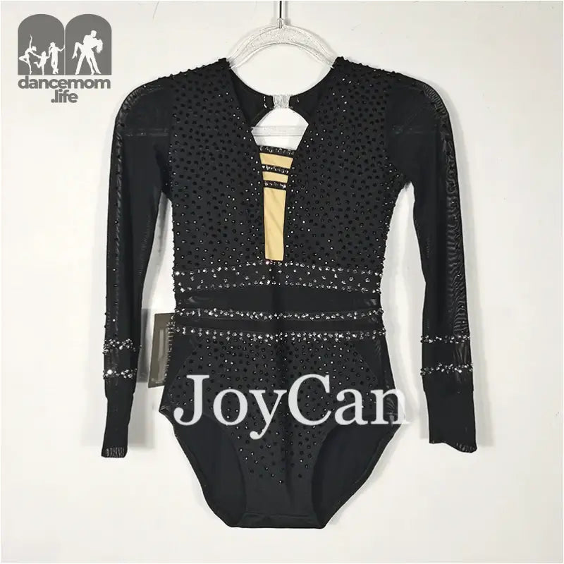 Black sparkly long-sleeved gymnastics leotard with rhinestone embellishments and mesh details.