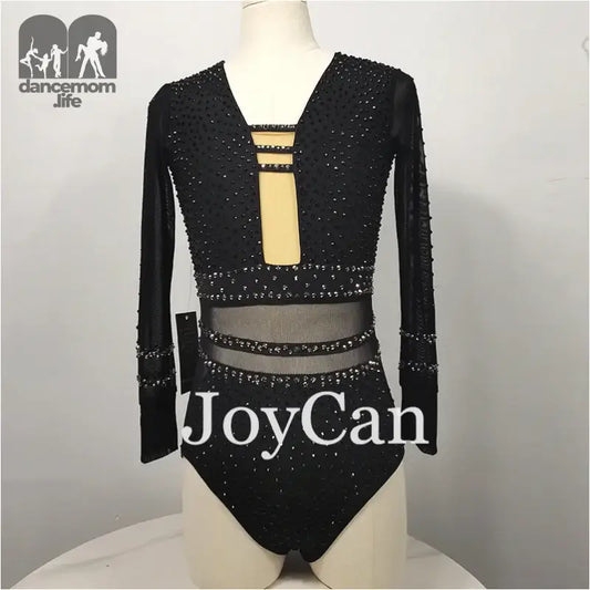 Black sparkly long-sleeved bodysuit with cutout details and strappy accents.