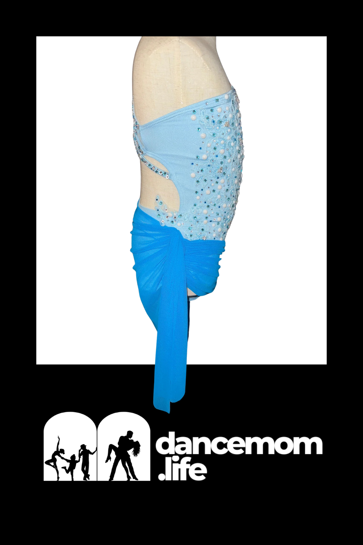 Light blue sequined dance leotard with a matching flowing skirt.