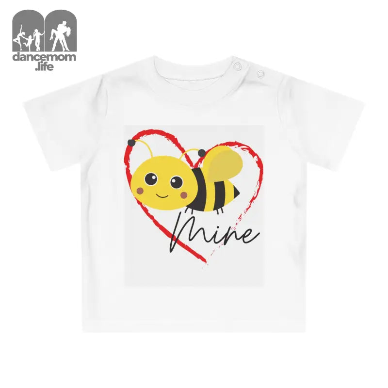 White t-shirt with a cute cartoon bee and heart design that says ’mine’