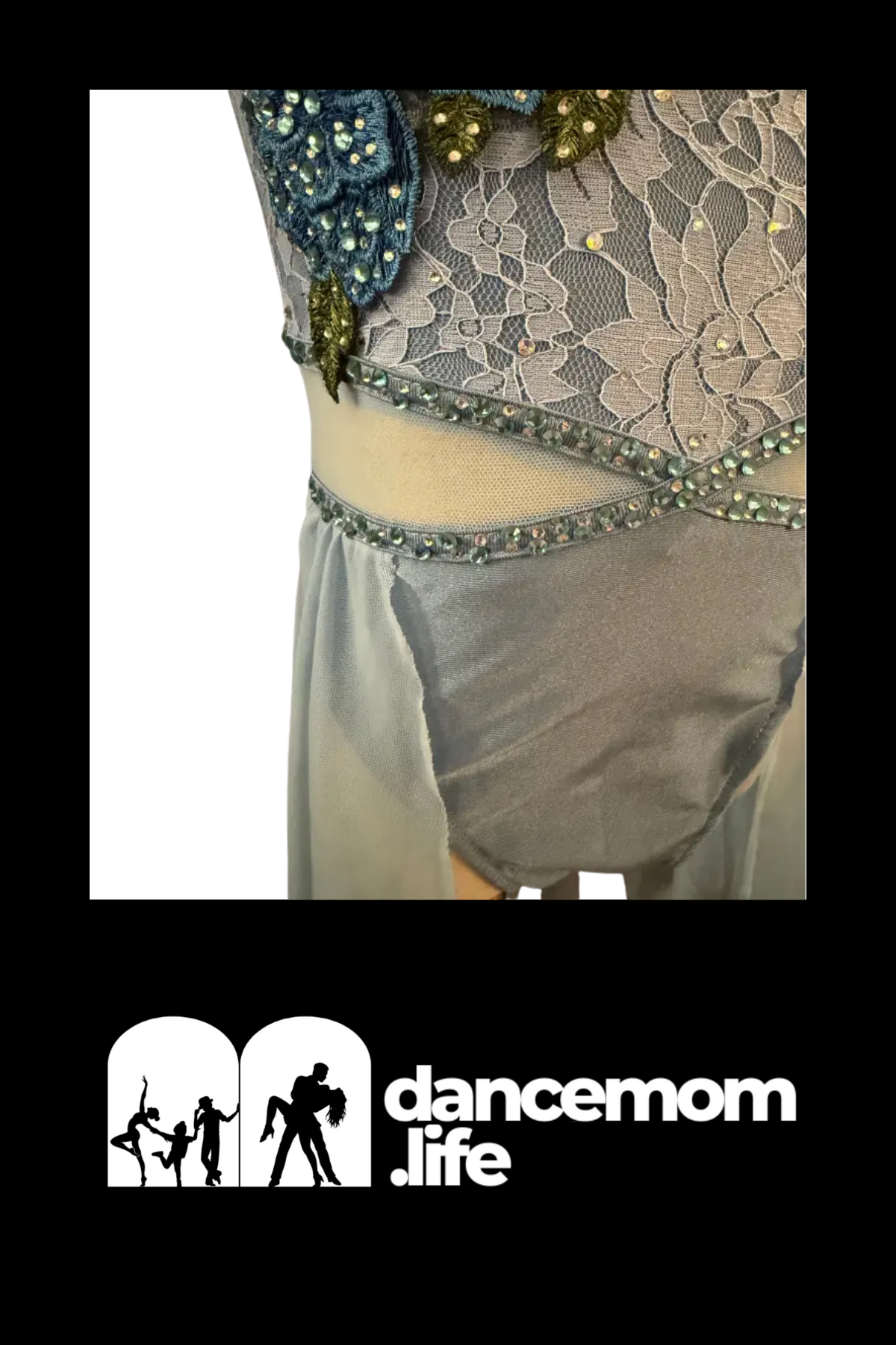 A shimmering gray dance leotard with intricate lace detailing and sparkling beaded embellishments.