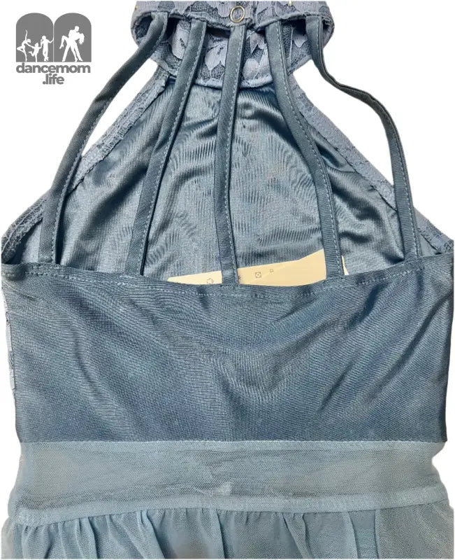 Gray halter-style sports bra or athletic top with mesh detailing.