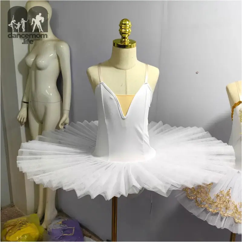 White classical ballet tutu with a plunging V-neckline bodice.