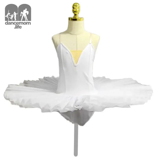 White classical ballet tutu with spaghetti straps and a stiff pancake-style skirt.