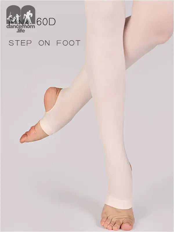 Pink dance tights with convertible foot openings.