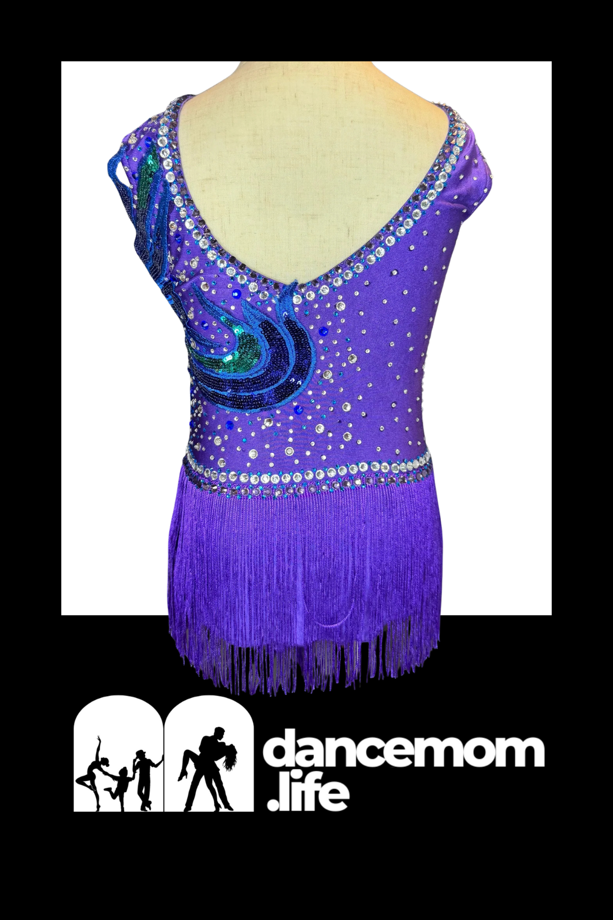 Purple sequined dance leotard with a teal and blue flame design, silver beading along the neckline and waistband, and purple fringe at the hem.