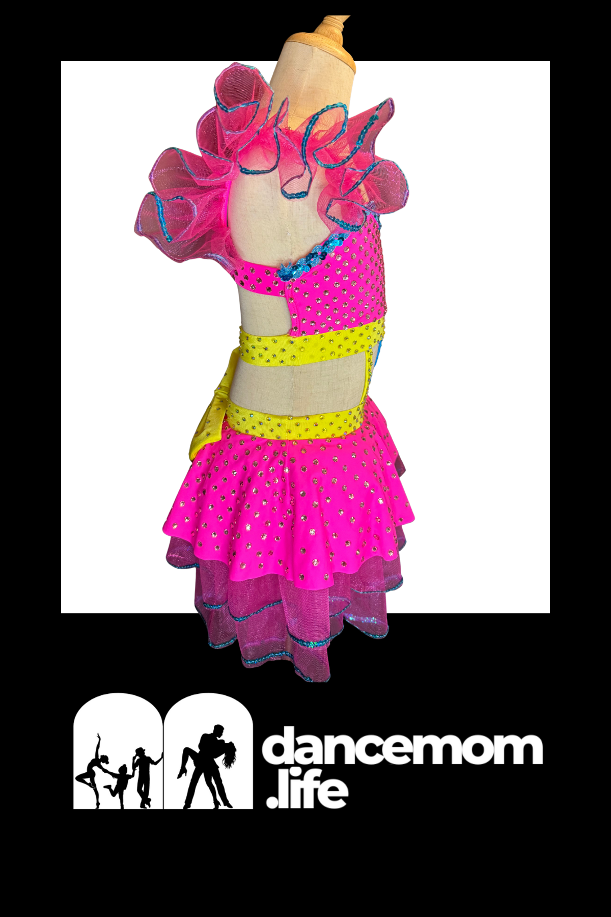 Vibrant pink sequined dance outfit with ruffled sleeves and layered skirt, accented by a yellow belt.