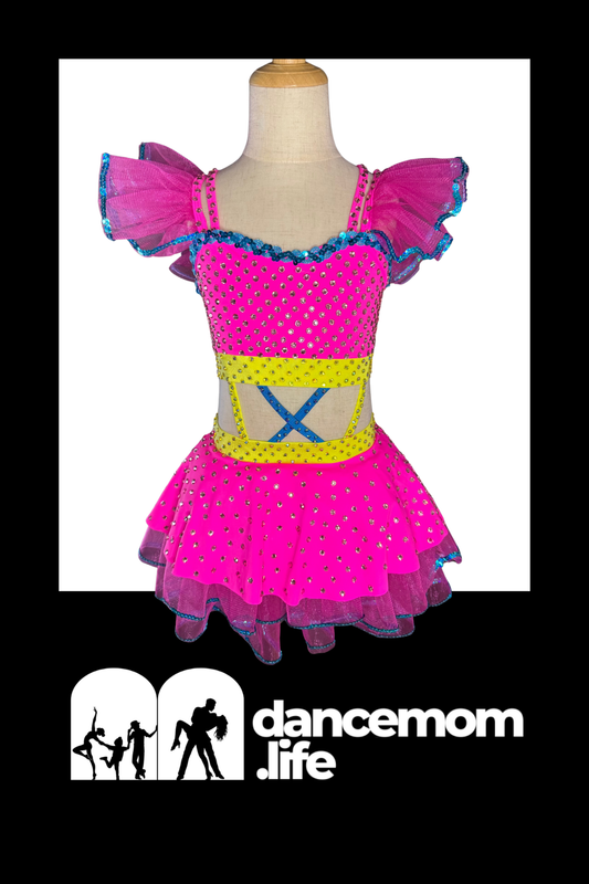 Bright pink dance leotard with sequined bodice, ruffled flutter sleeves and skirt trimmed in blue lace.