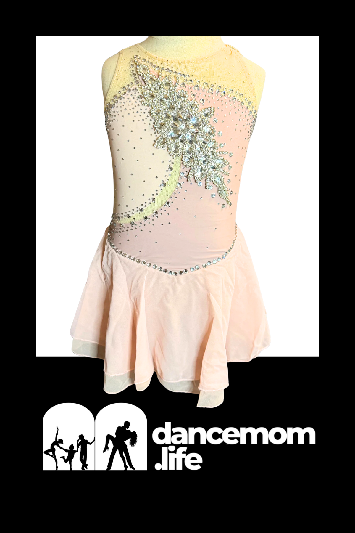 Pastel pink and yellow sleeveless figure skating dress with a sparkling silver leaf design adorned in rhinestones.