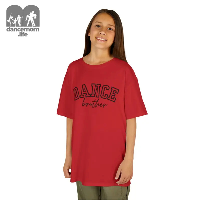 Red t-shirt with ’DANCE’ text printed in black letters.