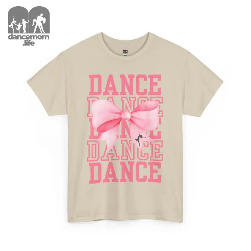 Beige t-shirt with pink ’DANCE’ text and bow design.