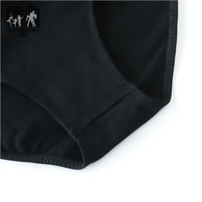 Black underwear with curved seam detail.