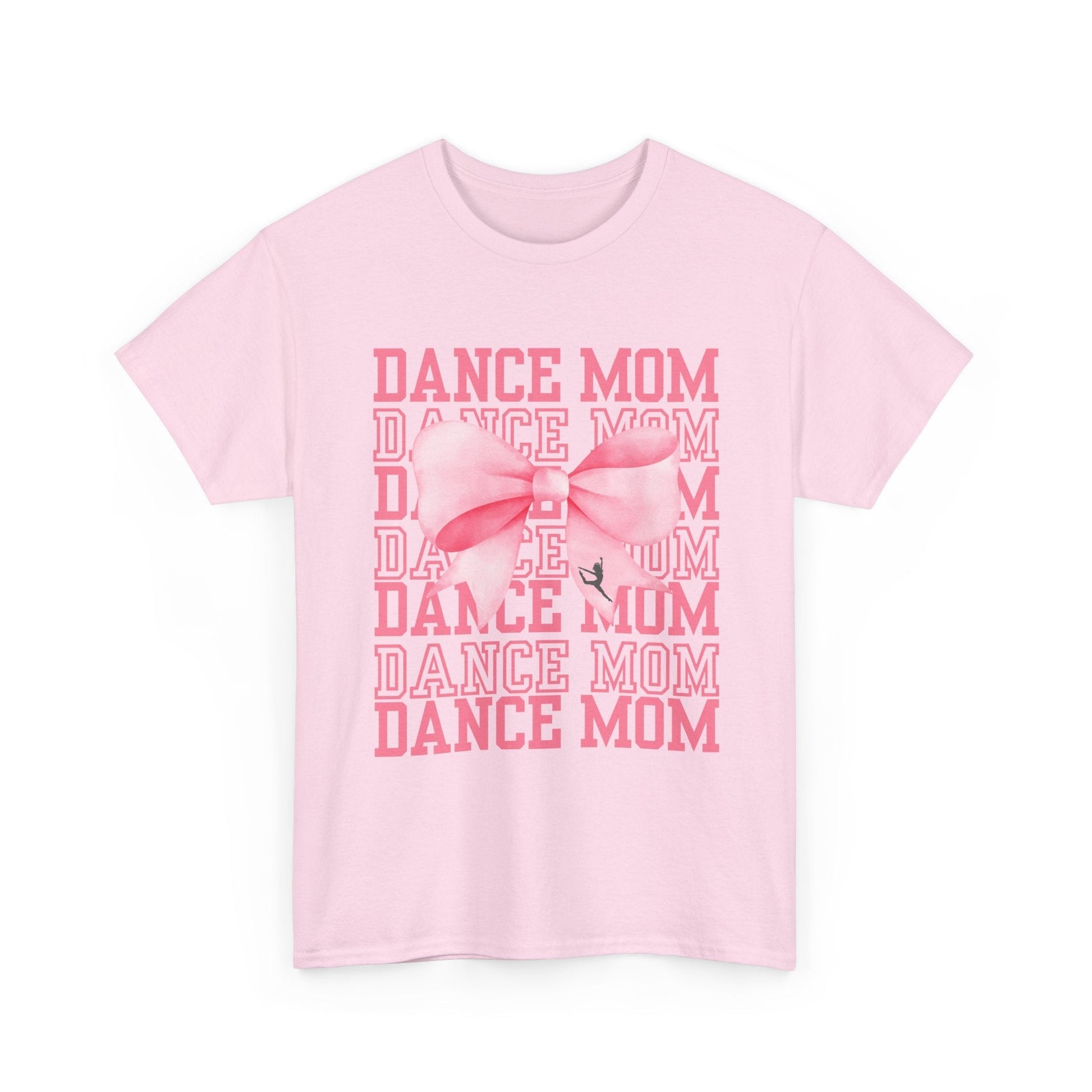 A soft pink cotton t-shirt featuring a bold graphic with the words ’dance mom’ repeated in stacked rows and accented by a large, stylized bow.