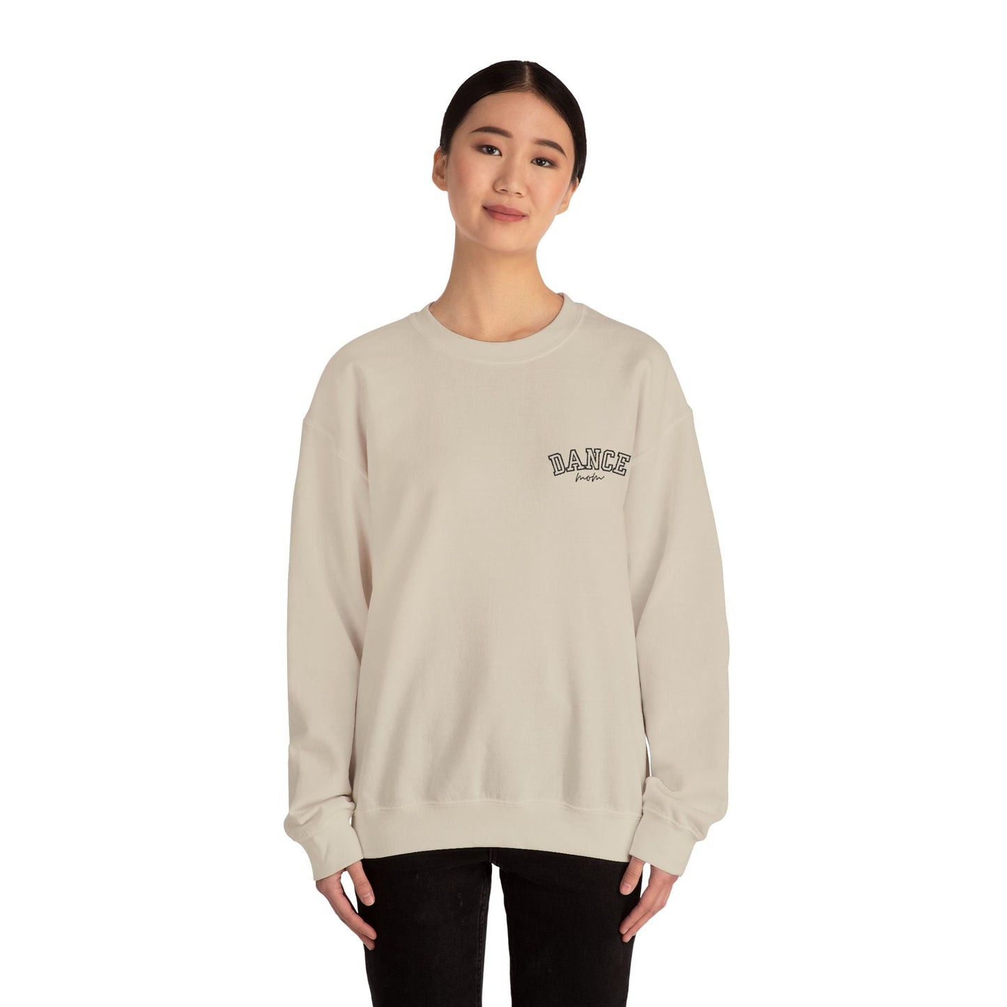 Beige long-sleeved sweatshirt with ’dance’ embroidered in black arched lettering on the left chest.