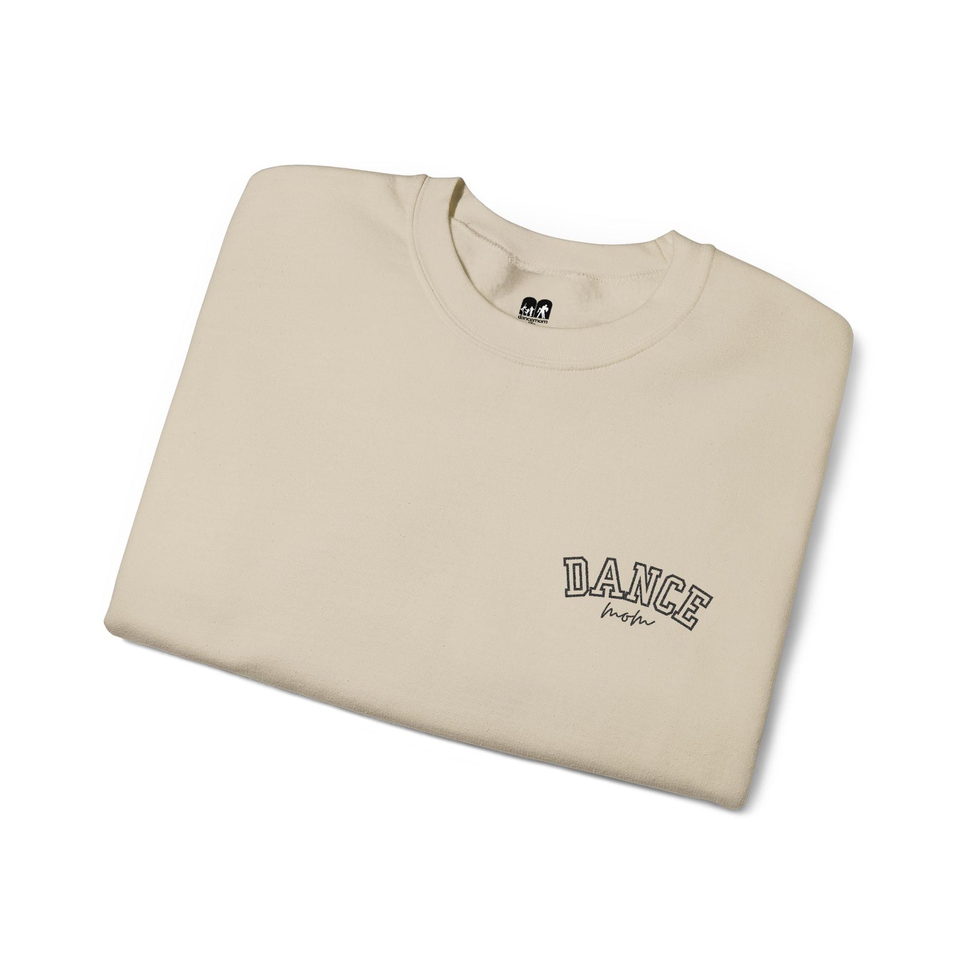 Beige crewneck t-shirt with ’dance’ embroidered in black arched lettering above the word ’high.’