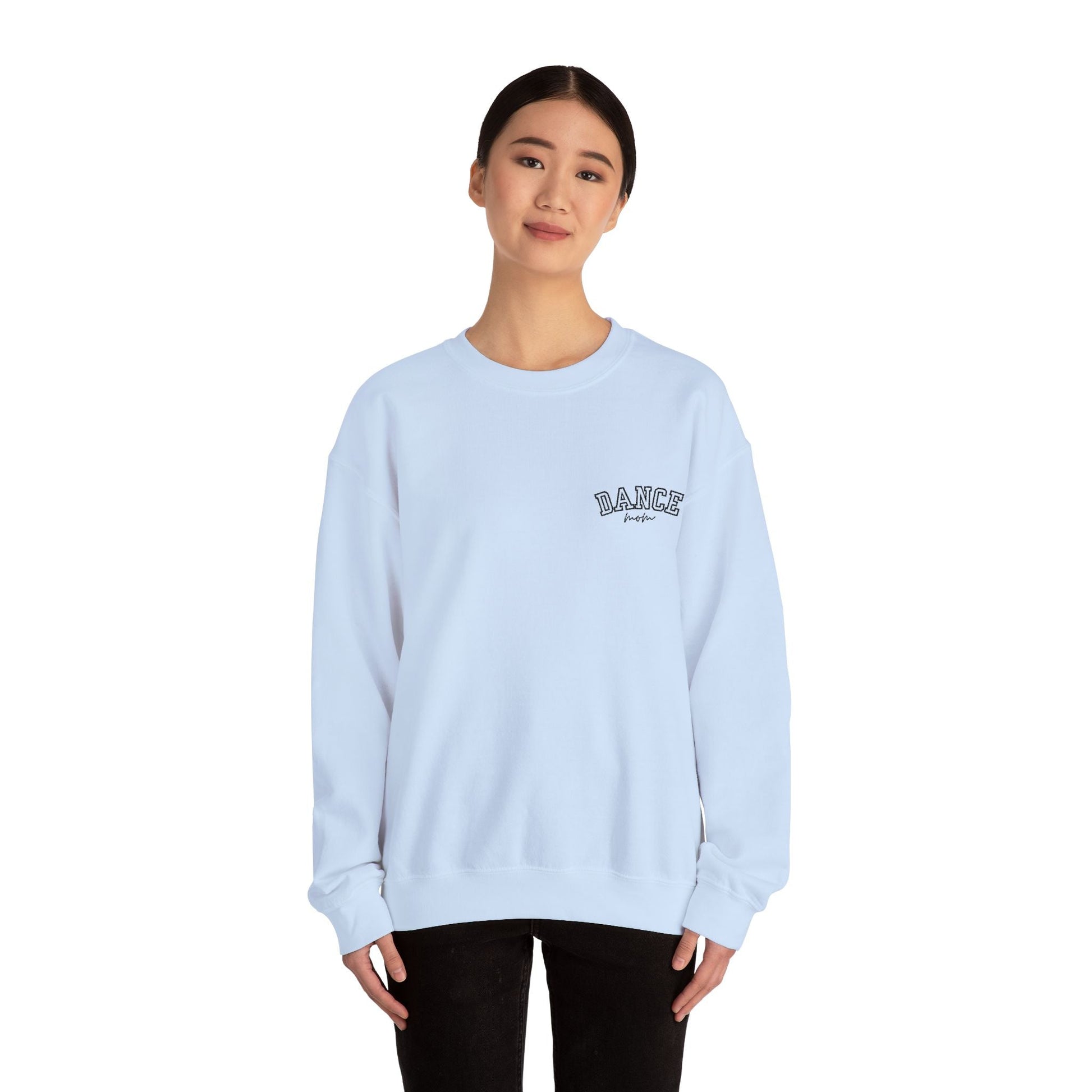 Light blue crewneck sweatshirt with ’dance’ embroidered in dark lettering on the left chest.