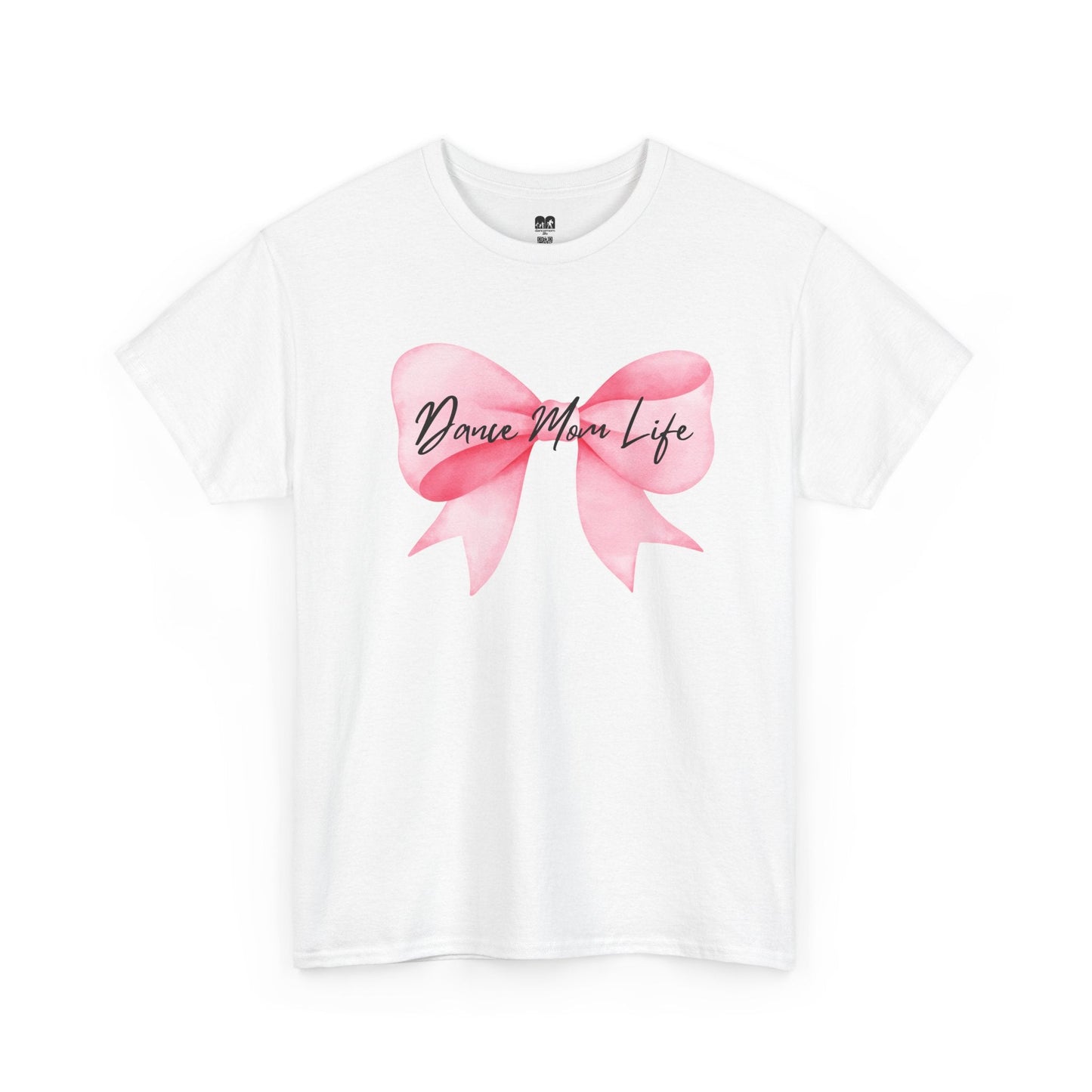 White cotton t-shirt featuring a watercolor-style pink bow with the text ’dance mom life’ in black cursive script across its center.