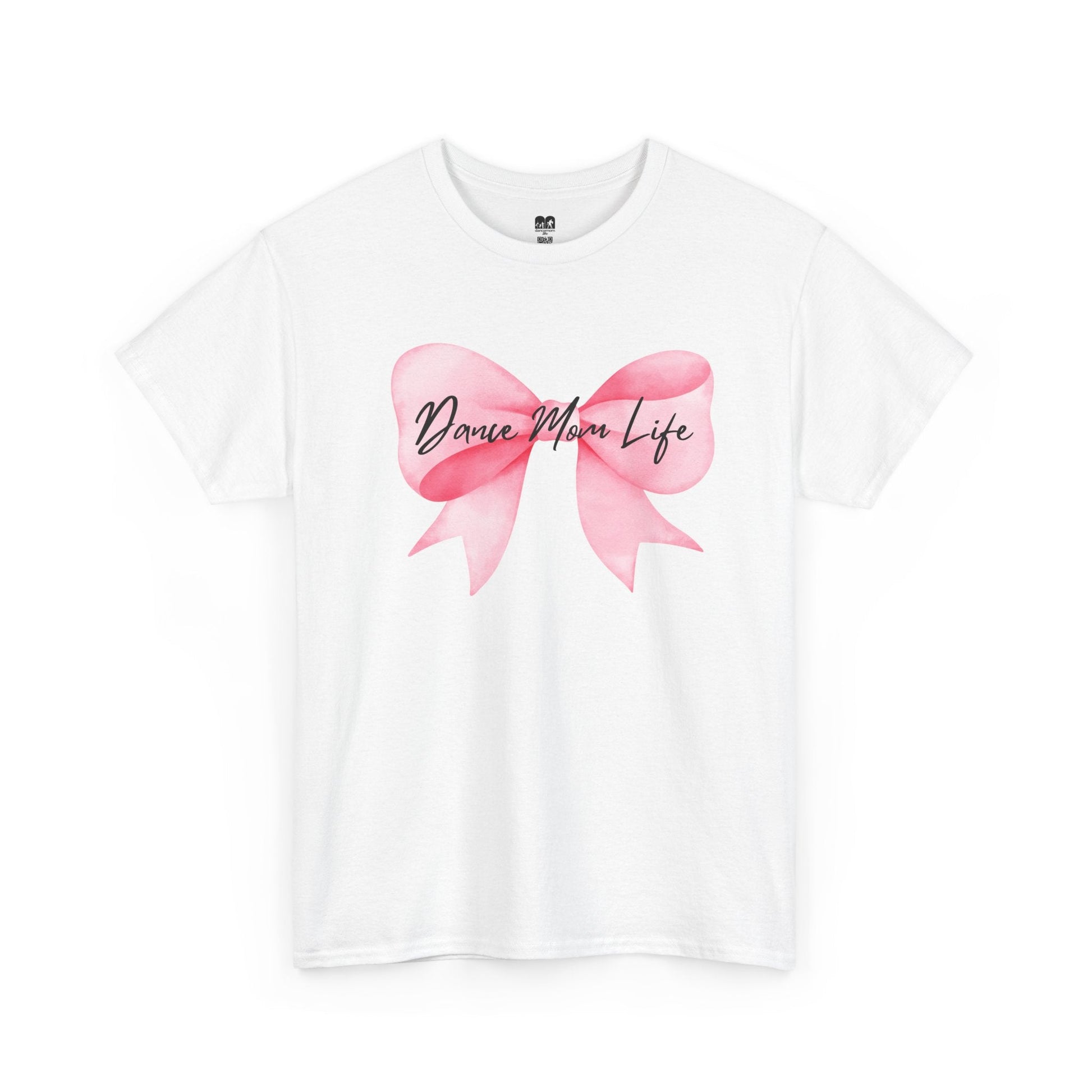 White cotton t-shirt featuring a watercolor-style pink bow with the text ’dance mom life’ in black cursive script across its center.