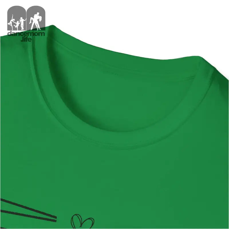 Green t-shirt or top with a partial view of a printed design.