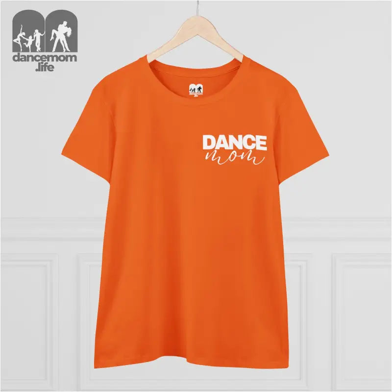 Orange t-shirt with ’DANCE’ text printed in white on the front.